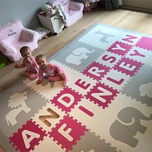 Girls Playroom with a Personalized Safari Animals Playmat in Pink, Light Gray, and White- D194